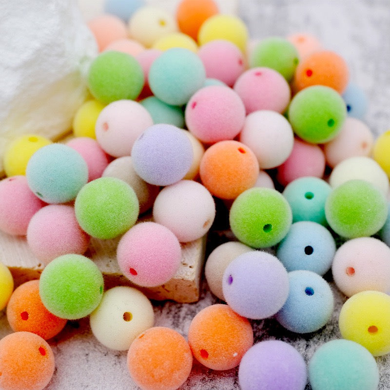 Flocked light-colored straight-hole beads (16 mm)