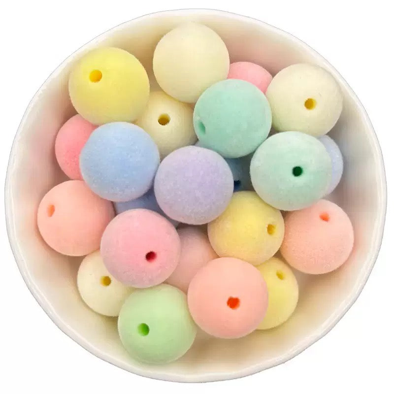 Flocked light-colored straight-hole beads (16 mm)